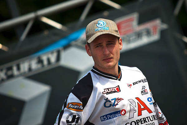 Michek Claims Qualifying Race Victory